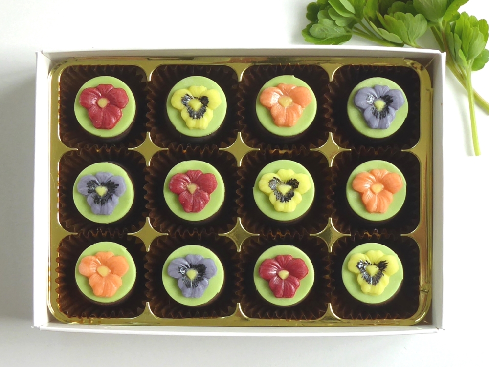 Handmade pansies on chocolates